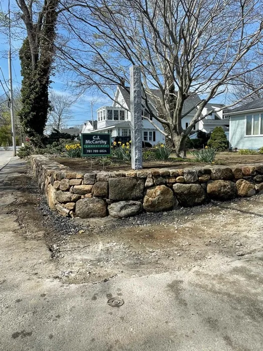 Natural fieldstone wall installation