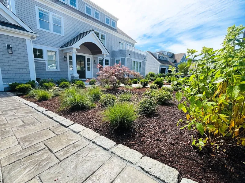 Ornamental grasses and shrub planting design at a South Shore residence